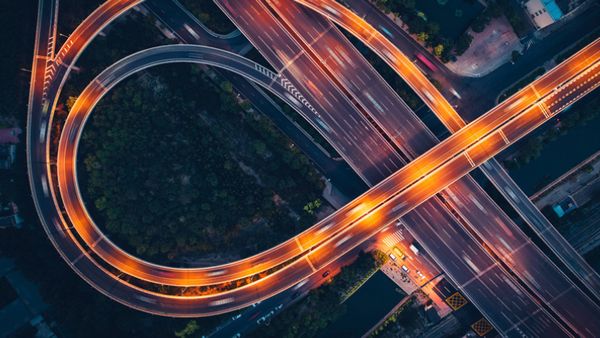 Bird's eye view of freeway overpass at night