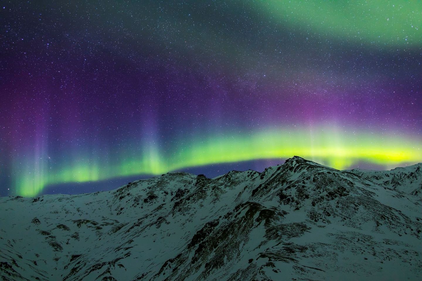 Night sky over mountains