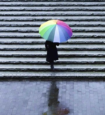 person holding umbrella