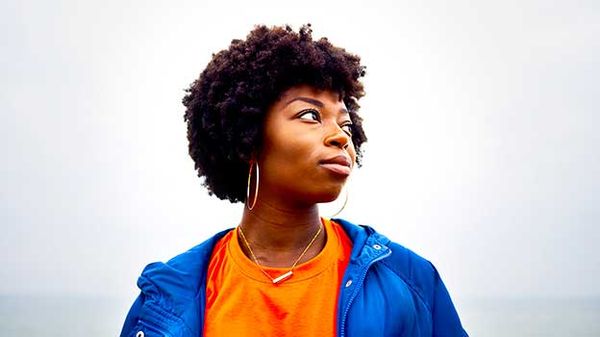 A woman looking peacefully into the distance