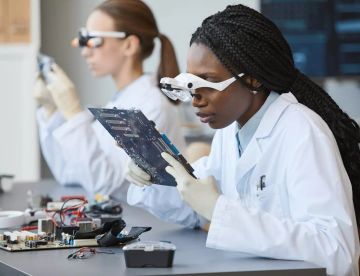 A solar panel technician working on solar panels.?