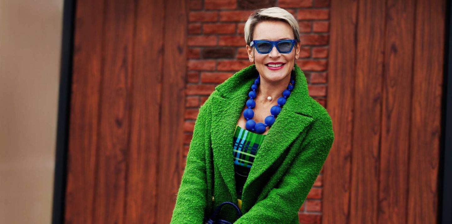 woman in green coat