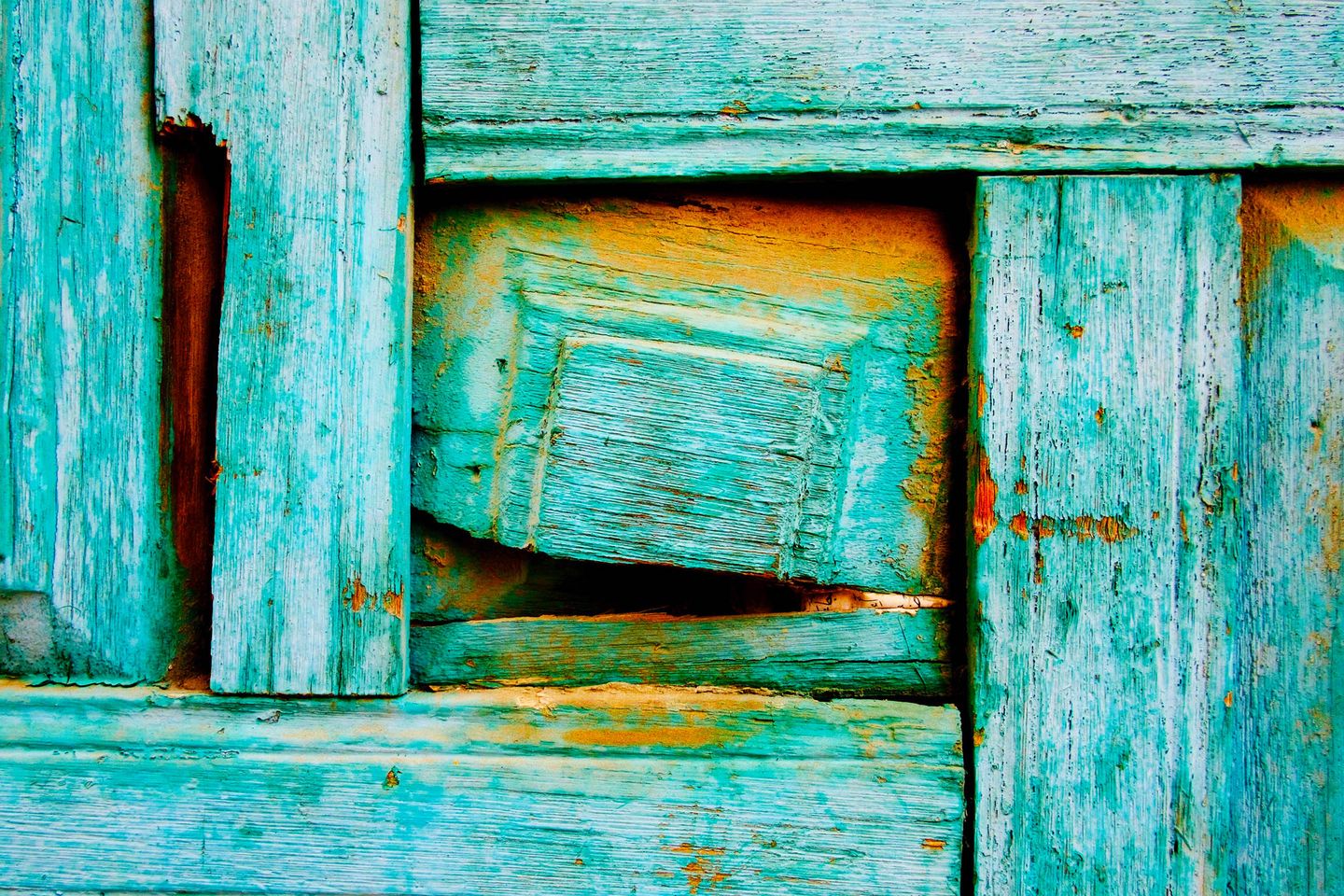 Weathered turquoise wooden planks
